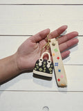 Mini Luxury-Style Handbag Keychain – Cream & Black Silicone Bag Charm