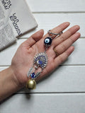 Evil Eye Peacock Bell Keychain – Blue Nazar Charm with Hanging Ghanti