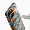 Artistic waterfall valley phone cover close-up with autumn trees, golden moon, and camera cutout