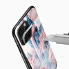 Dreamy waterfall Glass Mobile Cover close-up with pastel blue mountains, pink blossoms and camera cutout detail