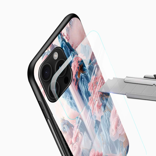 Dreamy waterfall Glass Mobile Cover close-up with pastel blue mountains, pink blossoms and camera cutout detail